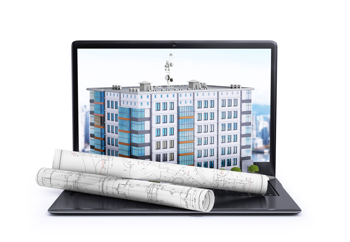 laptop with architectural rendering and blueprints