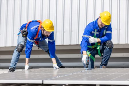 Engineers installing Flat Lock Panels